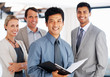 Foto: Happy business team in office Happy business team in office