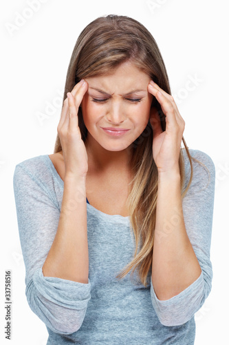 Photo: Woman with severe headache Woman with severe headache