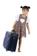 small girl with big suitcase