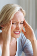 Woman with severe head pain