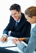 Business people reading report