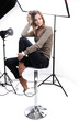Photo: Young beautiful model posing in professionally equipped studio Young beautiful model posing in professionally equipped studio