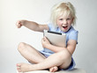 Cute little girl has a lot of fun with her touchpad Cute little girl has a lot of fun with her touchpad