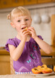little girl with peach