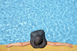 women in a relaxed position in the pool with pamela