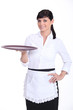 Waitress with an empty tray