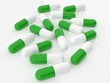 Cápsulas blancas y verdes