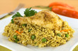 Arroz con Pollo (rice, chicken, peas, corn, aji, cilantro)