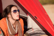 Camping happy woman lying in tent alone Camping happy woman lying in tent alone
