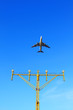 Plane fly up over take-off runway from airport at daytime