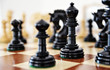 Chess pieces on wood board