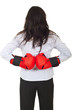 Back of businesswoman hiding gloves