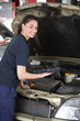 Happy Woman Mechanic with Diagnostic Tool
