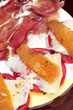 tomato with parmigiano cheese and serrano ham