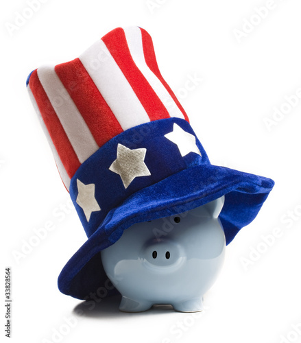 Photo: Piggy bank and uncle sam Piggy bank and uncle sam