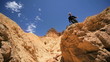Female Trekking in Extreme Desert Canyons