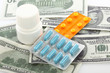 Pills and dollar bills