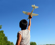 boy running airplane model boy running airplane model