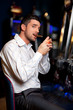 casino player smoking cigar