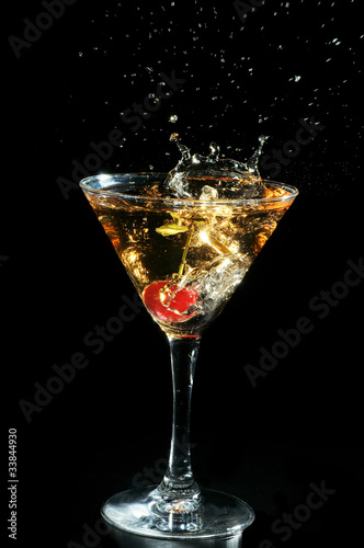 Photo: Cherry in a glass with champagne Cherry in a glass with champagne