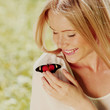 Woman playing with a butterfly