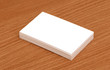 Blank business cards stacked up on a desk