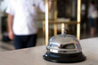 Hotel bell and bellboy at the background. Hotel bell and bellboy at the background.