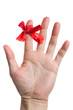 Red bow on finger
