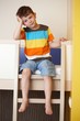 Sleepy little boy on bunk bed