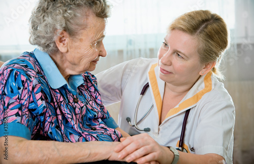 Photo: Senior woman with her home caregiver Senior woman with her home caregiver