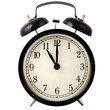 Old Alarm Clock in black and white, showing eleven o'clock.