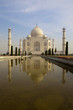 Taj Mahal from southern entrance reflected in the pond Taj Mahal from southern entrance reflected in the pond