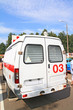 car to ambulance on road