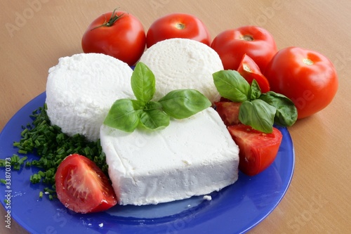 Photo: white cottage cheese,tomatoes and basil herb white cottage cheese,tomatoes and basil herb