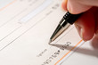 Photo: Writing a check Writing a check