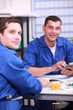 Industrial workers discussing