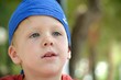 Photo: Bellissimo bambino con la bandana azzurra Bellissimo bambino con la bandana azzurra