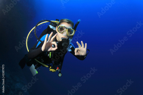 Photo: Young Woman Scuba Diver Young Woman Scuba Diver