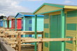 Row of colorful newly painted beach huts in Whitstable Row of colorful newly painted beach huts in Whitstable