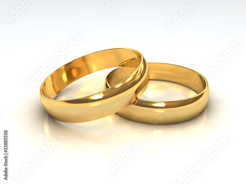 Illustration: Trauringe aus Gold übereinander liegend Trauringe aus Gold übereinander liegend