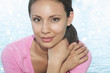 Beautiful young woman's face with lake background