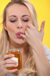 Woman tasting marmalade