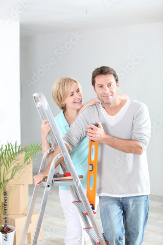 Photo: Couple redecorating home Couple redecorating home