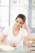 Photo: Attractive girl doing homework Attractive girl doing homework