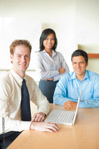 Photo: Caucasian Businessman Led Diverse Meeting Caucasian Businessman Led Diverse Meeting
