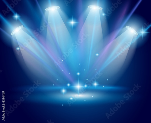 Vector: Magic Spotlights with Blue rays and glowing effect Magic Spotlights with Blue rays and glowing effect