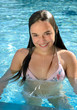 Foto: Teenagergirl am Poolrand Teenagergirl am Poolrand