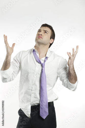 Photo: distressed unhappy young man distressed unhappy young man