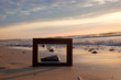 Frame on the beach at sunset