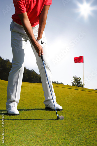 Photo: Man playing golf Man playing golf